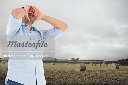 Composite image of shouting casual man standing