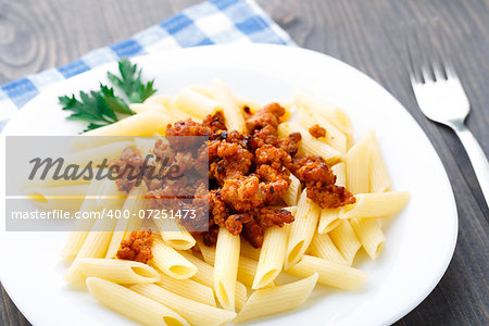 Delicious pasta with bolognese sauce on a plate