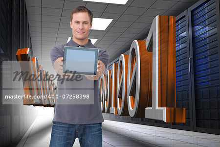 Composite image of young man showing screen of his tablet computer against a white background