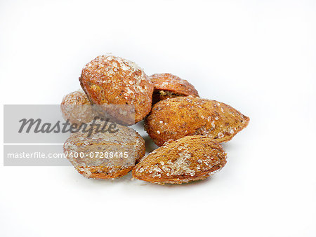 Salted shelled dried almonds isolated on a white background