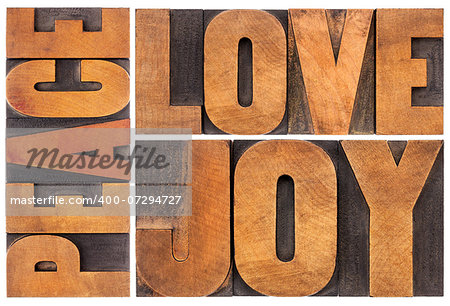 peace, love and joy typography  abstract - a collage of isolated words in letterpress wood type