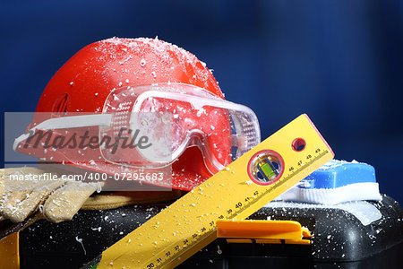 Safety New Year- protective equipment on artificial snow