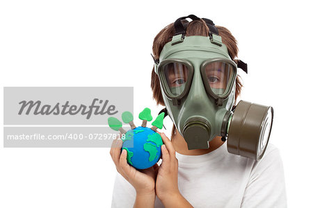 Forests importance - ecology concept with child wearing gas mask holding earth globe