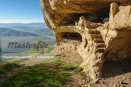 Caves at Tepe Kermen, Crimea, in the morning rays of sunlight