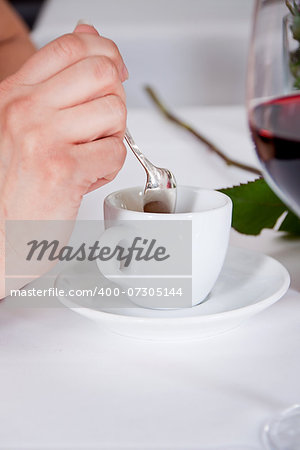 waiter serve fresh espresso for happy couple in restaurant