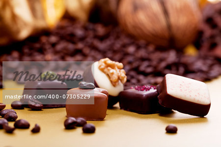 collection of different sweet chocolate pralines closeup background present sugar