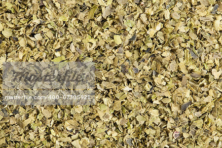 Background of dried  of sea lettuce  seaweed (Ulva lactucas). One of the most familiar of shallow salt water seaweeds, sea lettuce is a favorite among manatees and humans alike and can even be used as an ingredient in ice cream. It is very high in iron, protein, iodine, manganese, and nickel.