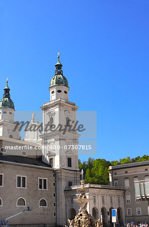 Famous cathedral and Residenzbrunnen fountain on Residenzplats, Salzburg, Austria
