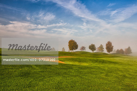 Autumn landscape on the empty golf course