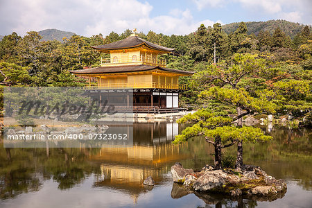 The Golden Pavilion, or Kinkaku, at the Rokuonji complex on the outskirts of Kyoto in Japan is covered in gold leaf. This is a World Heritage site.