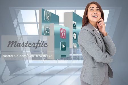 Happy businesswoman against room with large window showing city