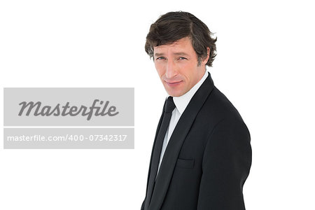 Portrait of handsome groom isolated over white background