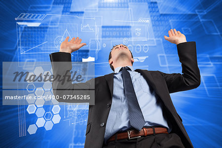 Businessman posing with arms raised against shiny background with squares