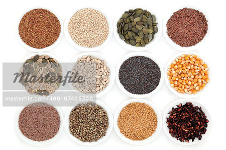 Healthy seed selection in porcelain bowls over white background.