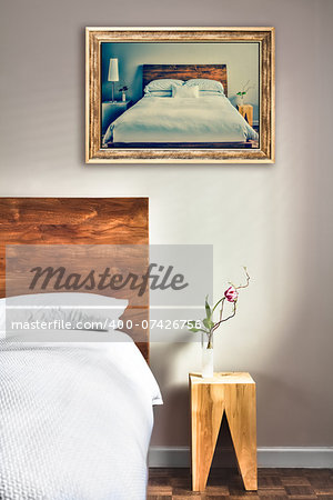Beautiful Clean and Modern Bedroom with fun Canvas on the Wall that is a repetition or infinity concept