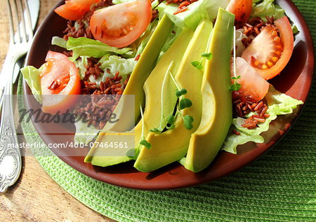 salad with avocado,tomatoes, lettuce,rice