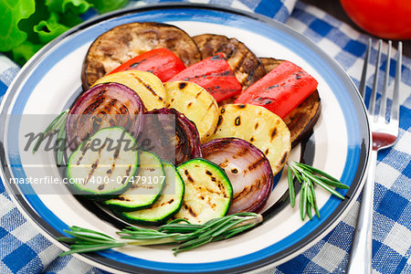 Grilled vegetables with rosemary on a plate