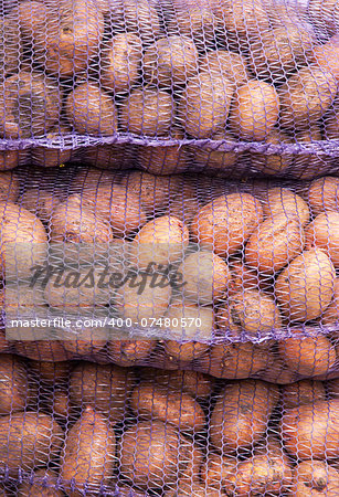 Sacks of fresh new potatoes from a farm