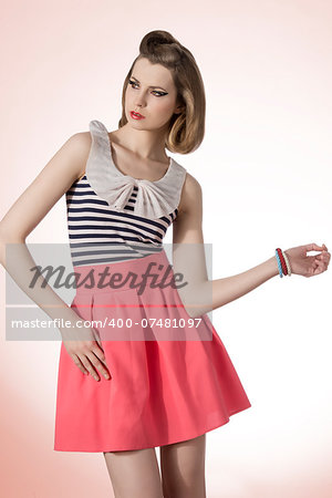 fashion shoot of sensual blonde woman with retro clothes and hair-style, cute make-up and bracelets fashion shoot of sensual blonde woman with retro clothes and hair-style, cute make-up and bracelets