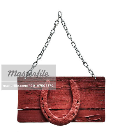 The old horseshoe and wooden sign and chain on white background