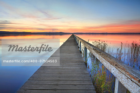 Magnificent sunset and lake reflections at Long Jetty, Central Coast NSW Australia