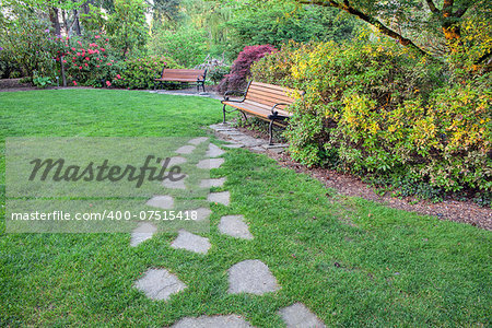 Natural Stone Steps on Green Grass Lawn to Park Bench
