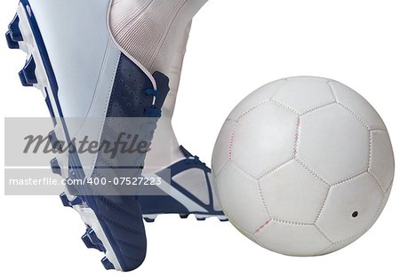 Close up of football player kicking ball on white background