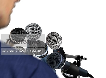 Man Giving Speech Using Microphones