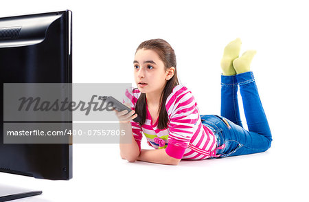 little girl watching LED tv laying on white background