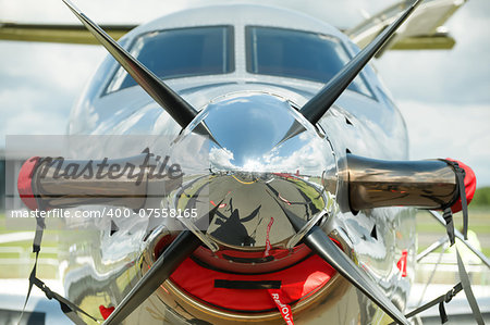 propeller aircraft on display at an airshow - no visible trademarks