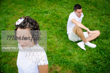 Conflict between man and woman. man sitting on background