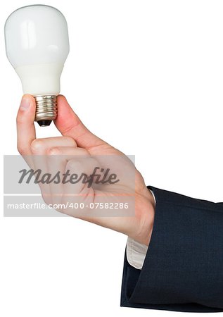 Hand holding energy saving light bulb on white background
