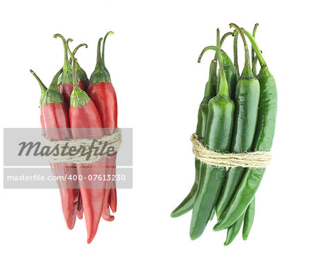 Two sets of red and green hot chili pepper on a white background