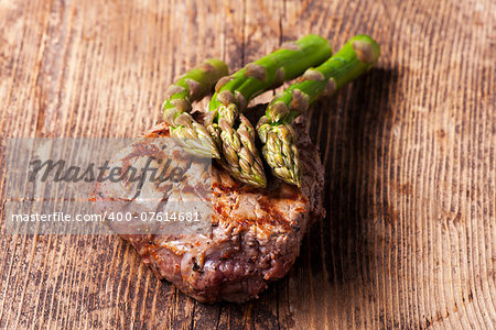 juicy grilled steak with asparagus