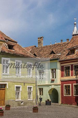 Colorful houses at the central square in Sighisoara, Romania