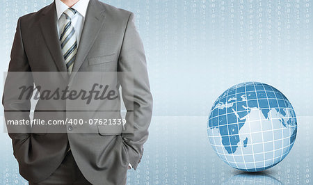 Businessman in a suit with background of Earth and figures. Business concept