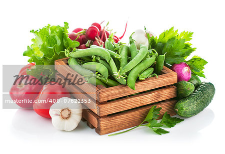 Fresh vegetable with greens. Isolated on white background