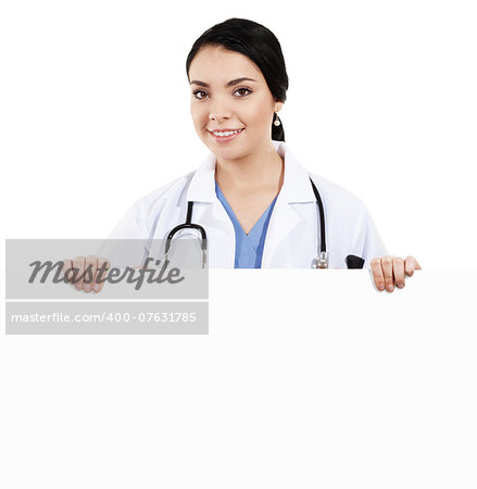 Stock image of female doctor holding blank sign over white background