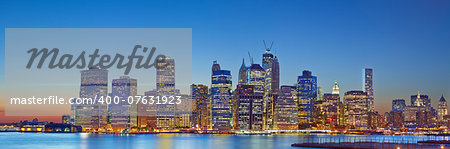 Panoramic image of Lower Manhattan at twilight blue hour.