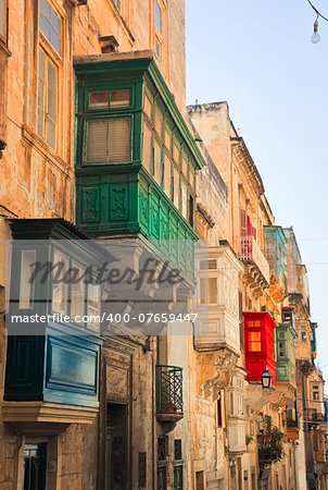 Green bow window of a house in Malta