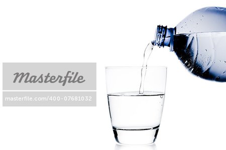 pouring a glass with water trough blue bottle and space for text on white background