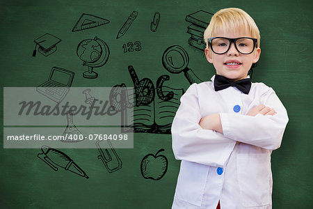 Cute pupil dressed up as teacher against green chalkboard