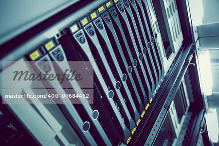 Black rack mounted server tower in large data center