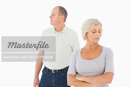 Older couple having an argument on white background