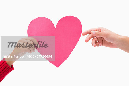 Woman passing man pink heart on white background