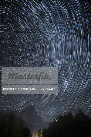 Star trails over the Mount Cervino in an autumn night, Aosta Valley