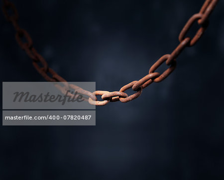 Old rusty chain. Very short depth-of-field.