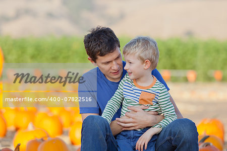 family of two at the pumpkin patch, fall fun