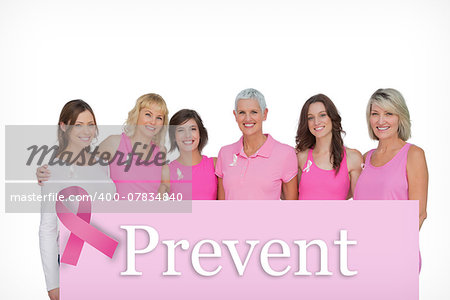 Smiling women wearing pink for breast cancer awareness against pink card