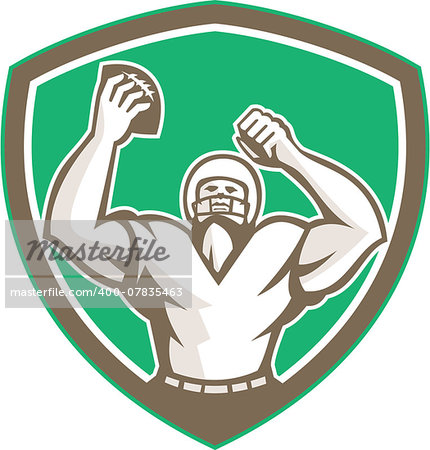 Illustration of an american football with helmet holding ball over head celebrating viewed from the front set inside shield crest on isolated background done in retro style.